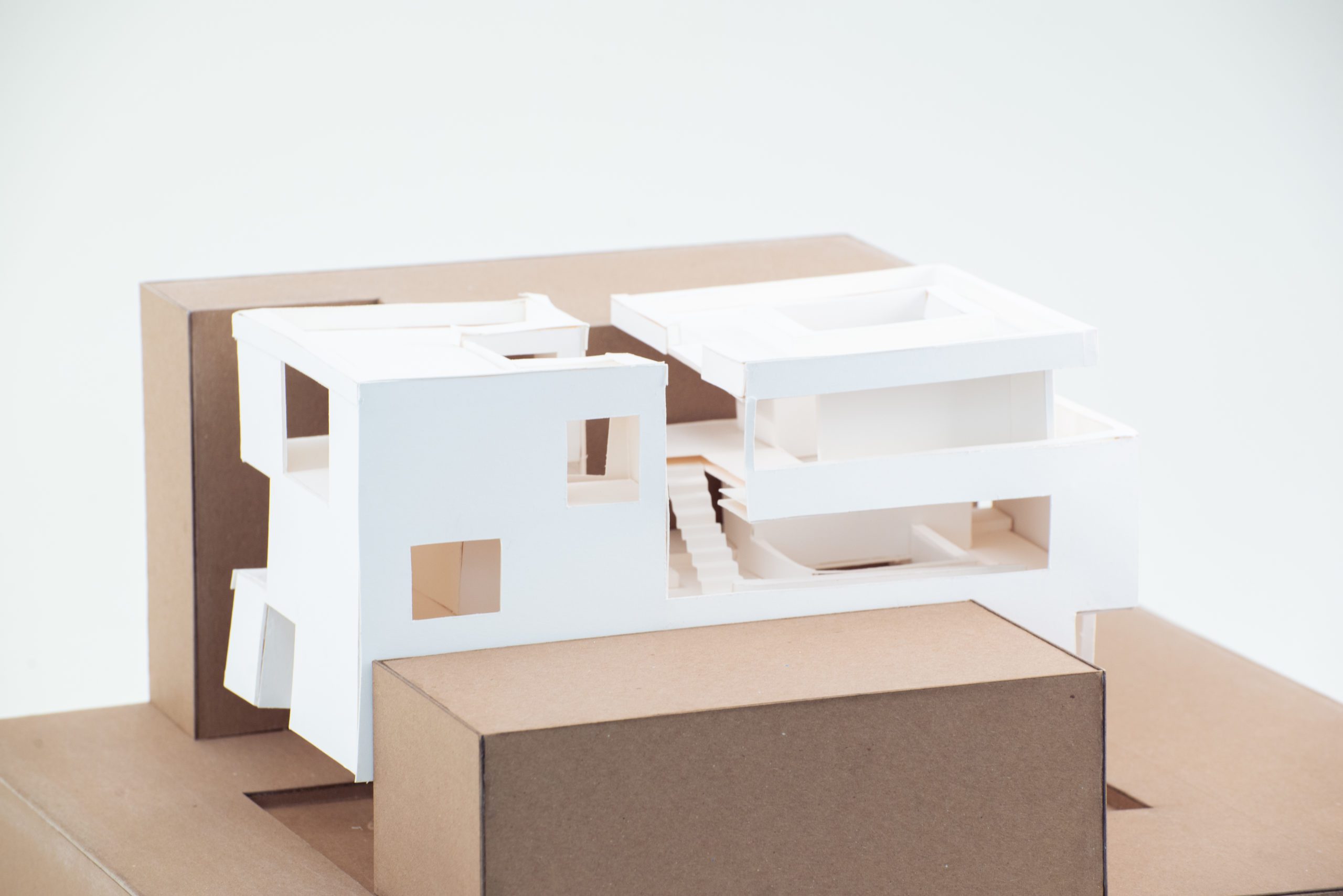 Exterior view of architecture model in-between cardboard boxes