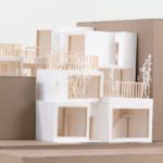 Architecture model in between carboard buildings