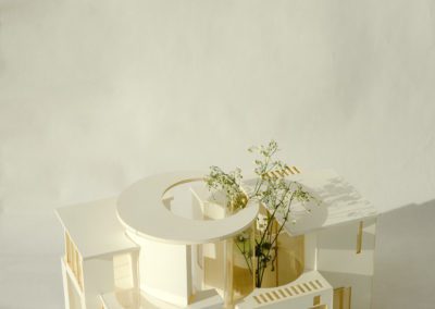 Exterior photo of architecture model with shadows and white space