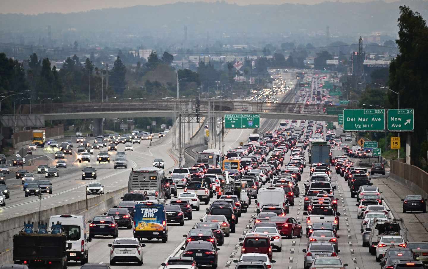 A highway full of vehicles in Los Angeles; Frederic J. Brown / Getty
