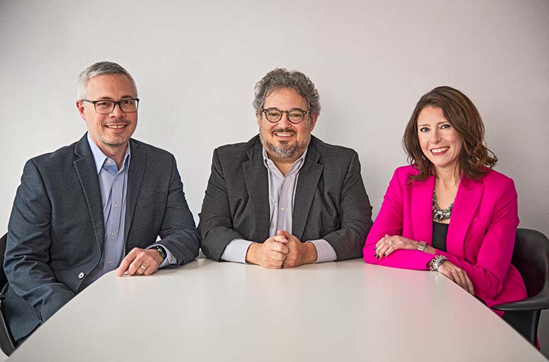From left, McIntosh Poris Architects principal John Skok, founding partner Michael Poris, and principal Laurie Hughet-Hiller.