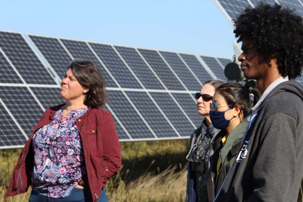 Sarah Mills taking students from URP 620 on tour of wind and solar facilities