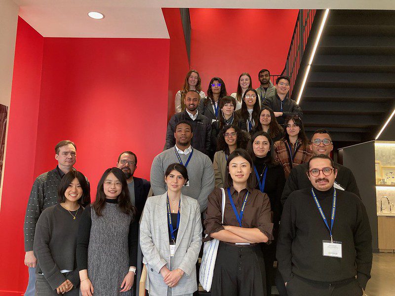 A group of people standing on the stairs