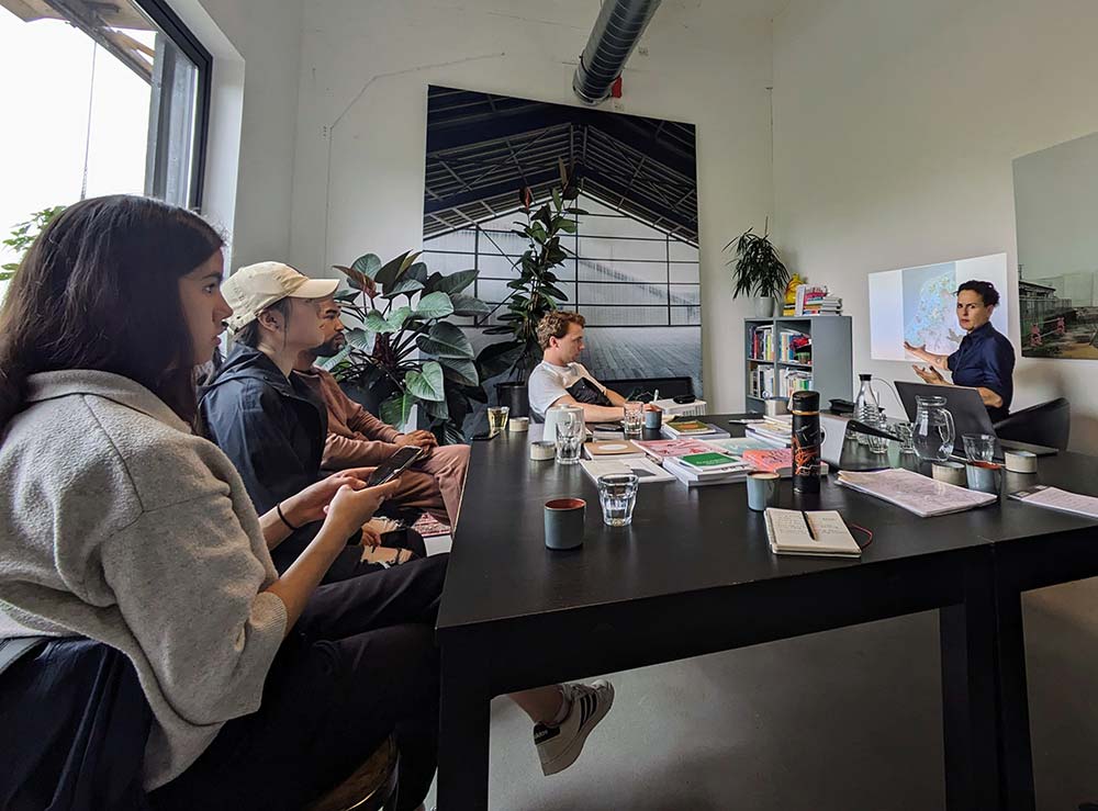 Students meeting with business leader
