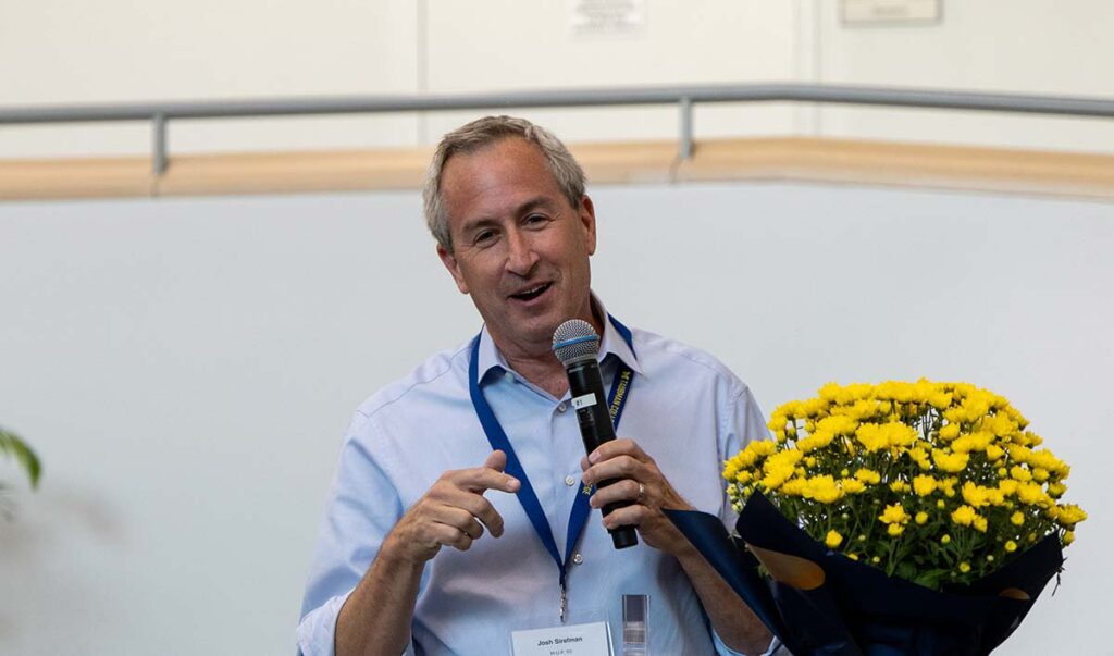 Josh Sirefman speaking to the audience