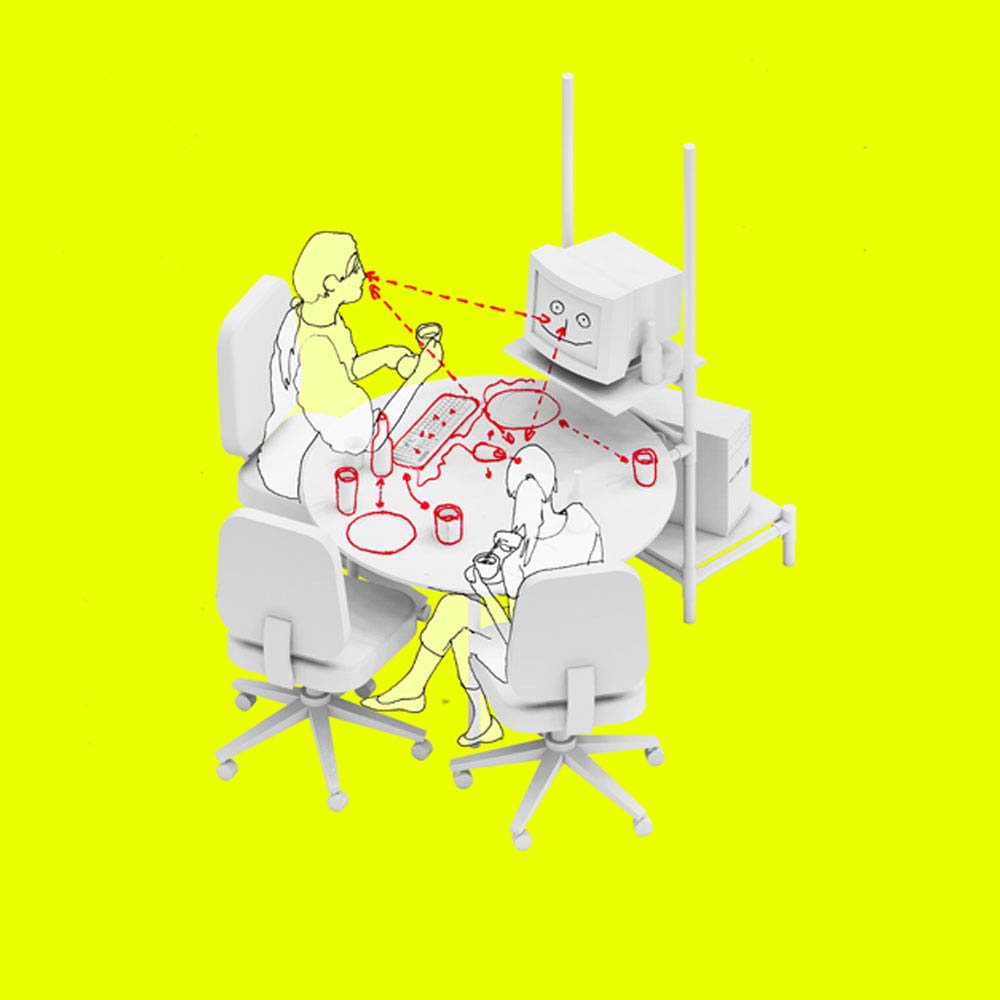 A pictogram of people sitting at a round table looking at an old CRT monitor