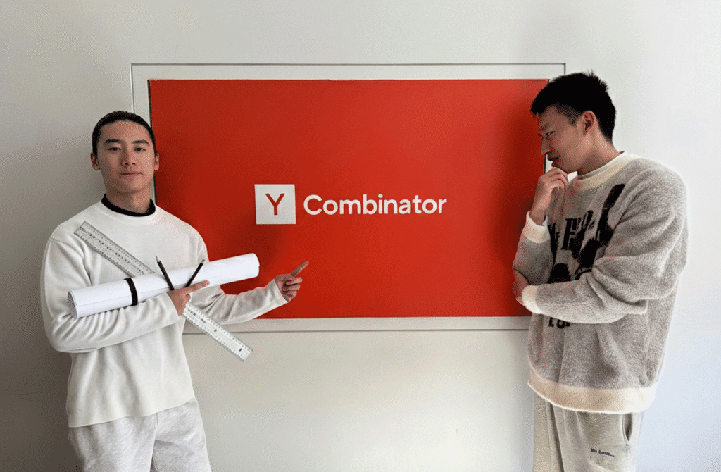 Two men looking bringing attention to a red sign that reads YCombinator