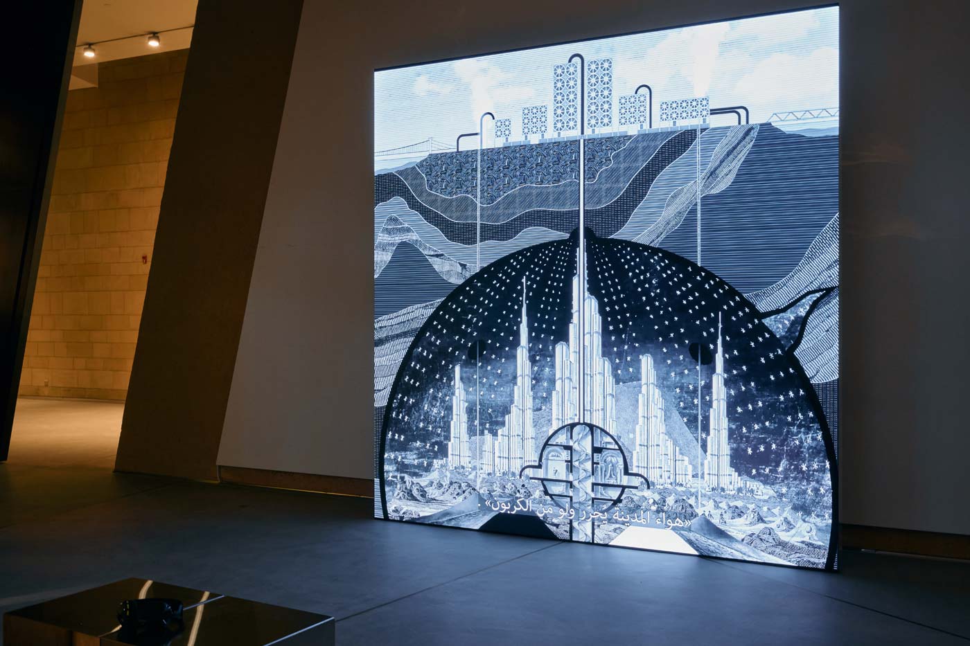 A large, backlit art installation depicts a circular dome framing an intricate, stylized cityscape.