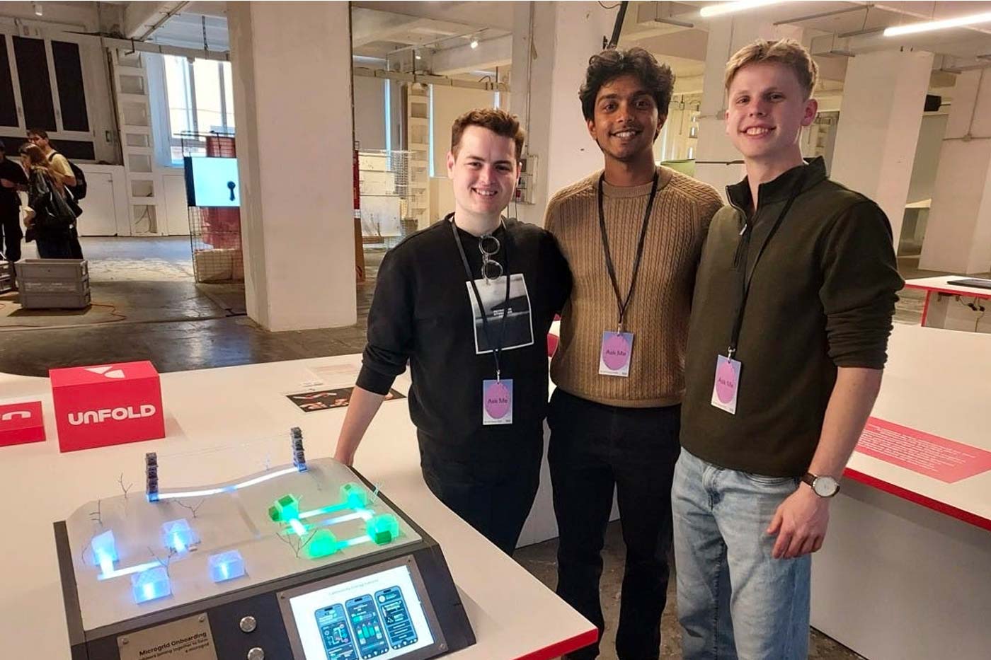 Jack Bernard, Pranav Boopalam, and Elijah Stowell showcasing their project