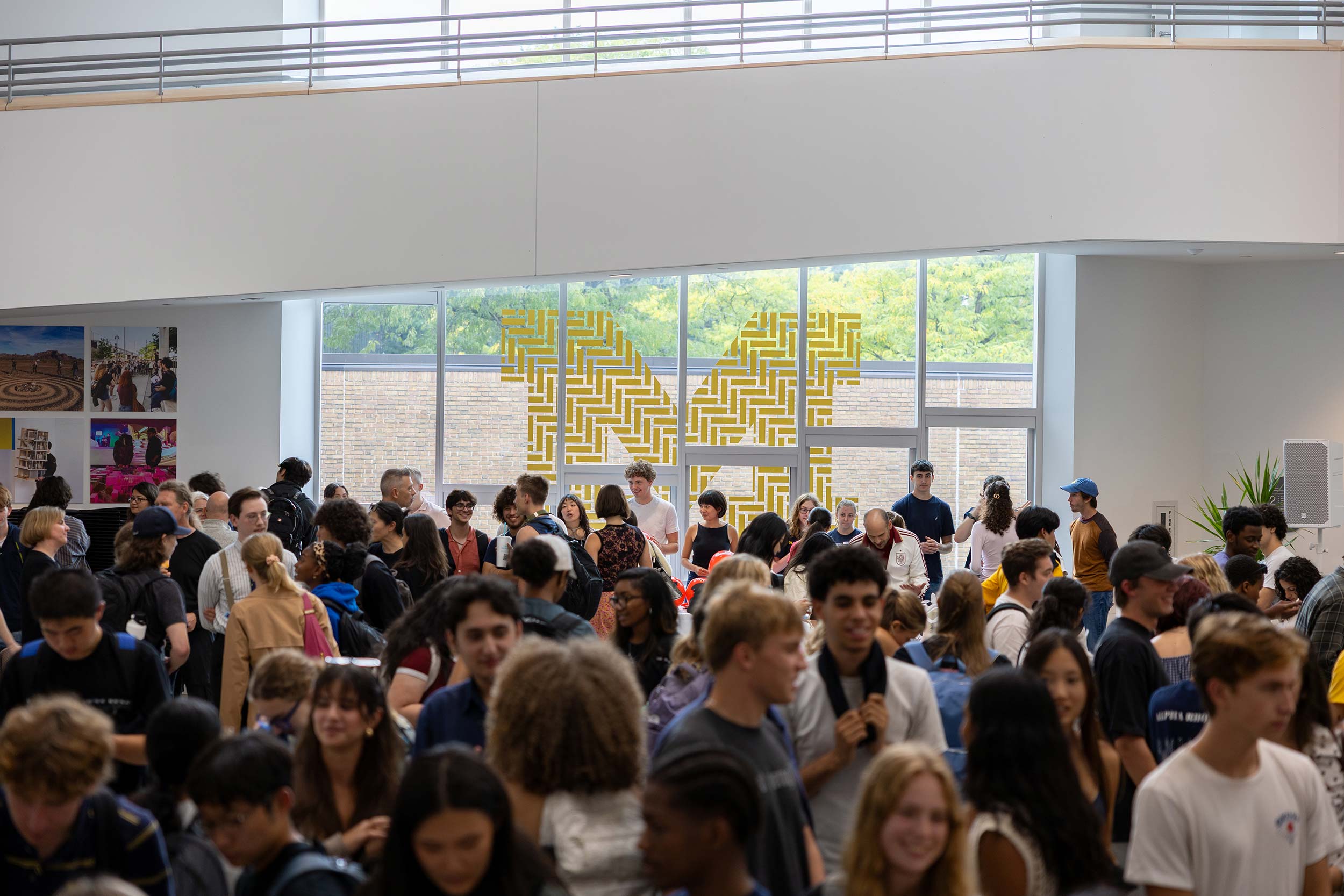 People gathered in the Commons during the welcome event