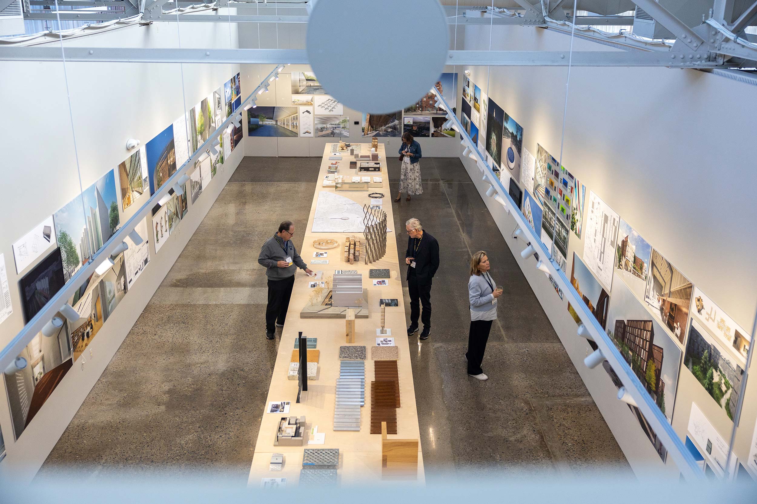 An overhead view of people perusing a gallery at the Liberty Annex